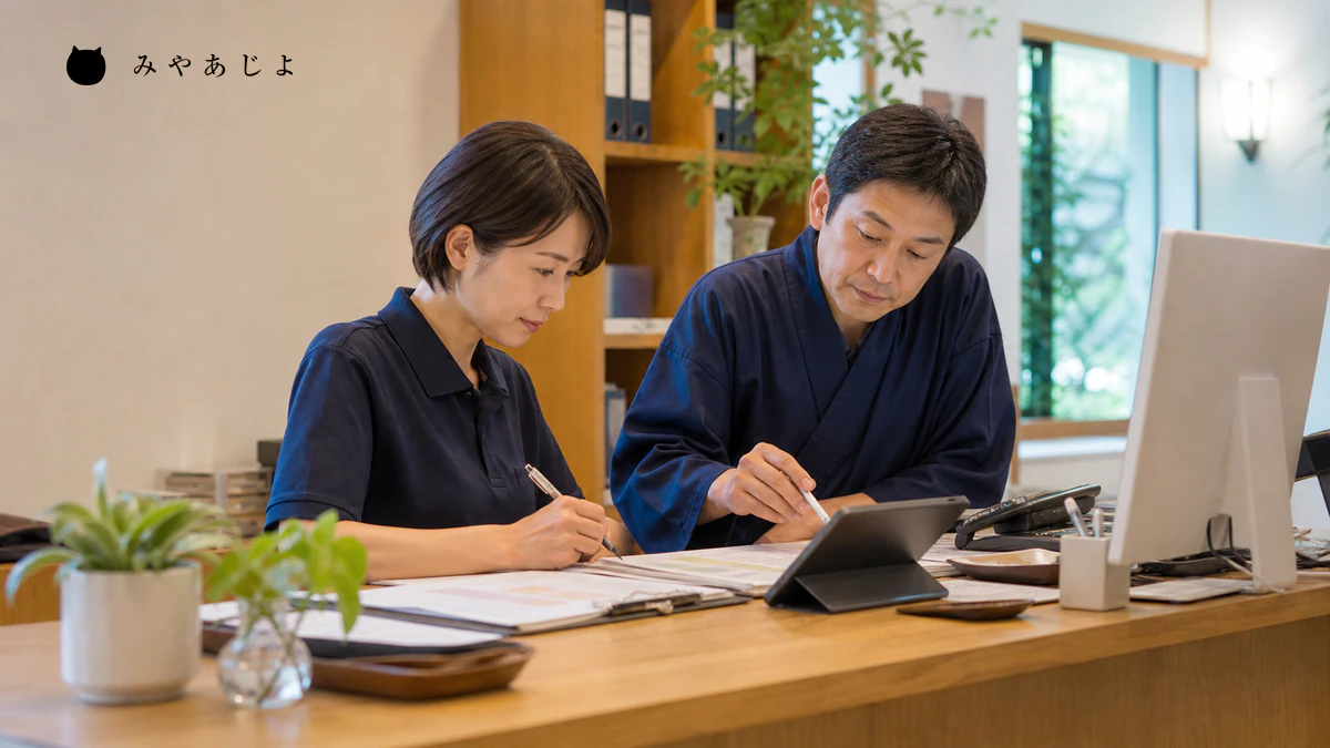 受付担当者が予約記録と確認連絡のチェックリストを照合するイメージ